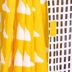 Vibrant Yellow Cotton Saree with Bold White Triangle and Black Geometric Border